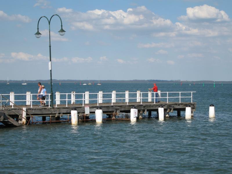 Hastings - Hastings Jetty and Pelican Park Recreation Centre: View east across the bay towards southern section of jetty