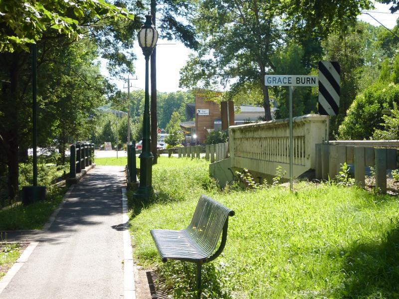 Healesville - Shops and commercial centre, Maroondah Highway east of Badger Creek Road: View east along path beside Maroondah Hwy towards bridge over Grace Burn