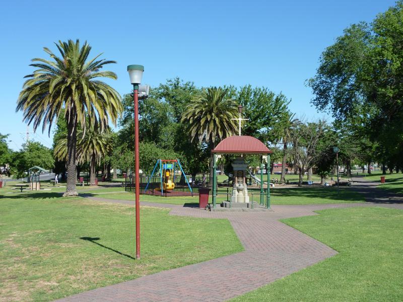 Horsham - May Park: View west through park towards war memorial and playground
