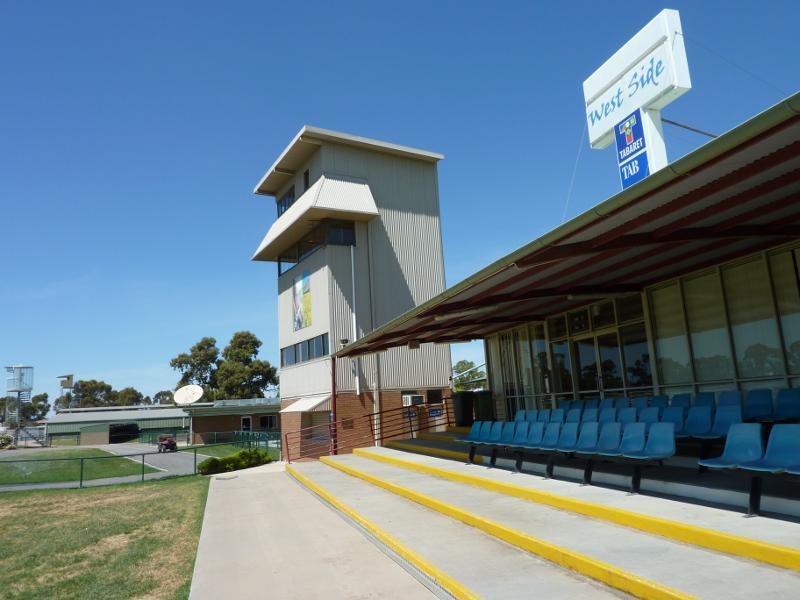 Horsham - Central Park and Horsham Racecourse: Outdoor seating at West Side Tabaret overlooking racetrack
