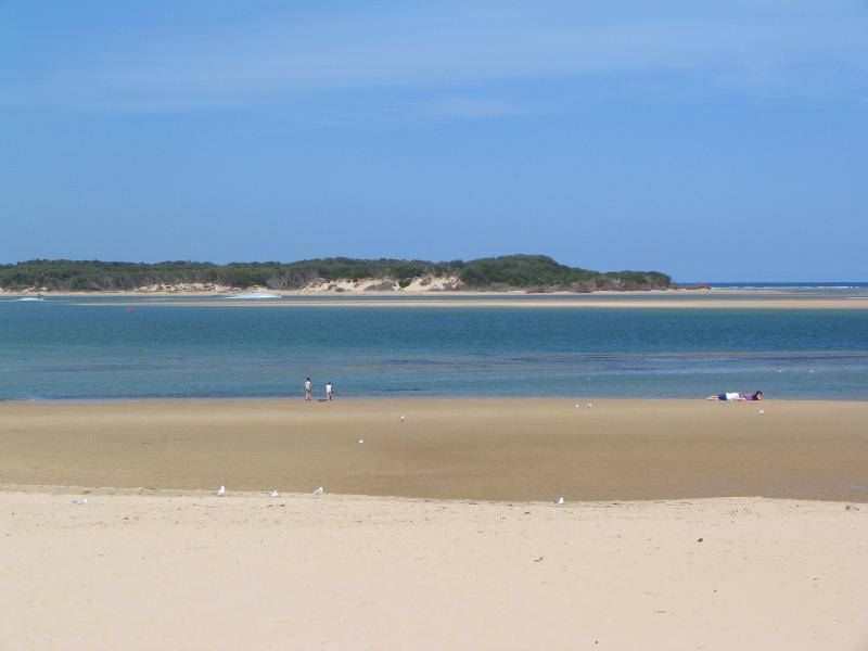 Inverloch - Inverloch town beach, Anderson Inlet west of Inverloch Jetty: View south across beach towards Point Smythe