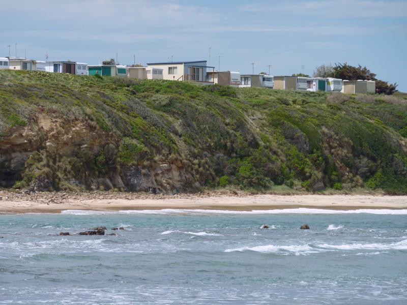 Kilcunda - Town beach: Caravan park perched on cliffs above beach