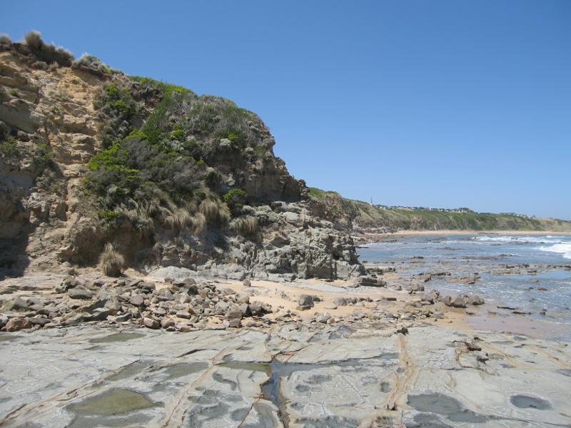 Kilcunda - Shelley Beach, west of town centre: View south-east along beach at eastern end towards headland and caravan park