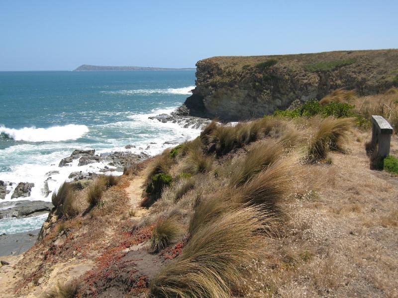 Kilcunda - Coastline along George Bass Coastal Walk at southern end of Mabilia Road: View north-west along coast towards Cape Woolamai