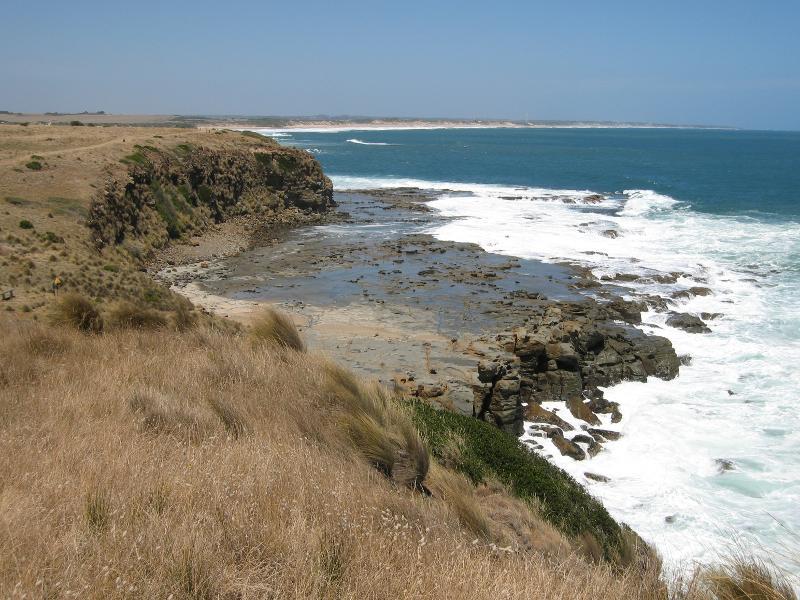 Kilcunda - Coastline along George Bass Coastal Walk at southern end of Mabilia Road: View south-east along coast towards rock platform