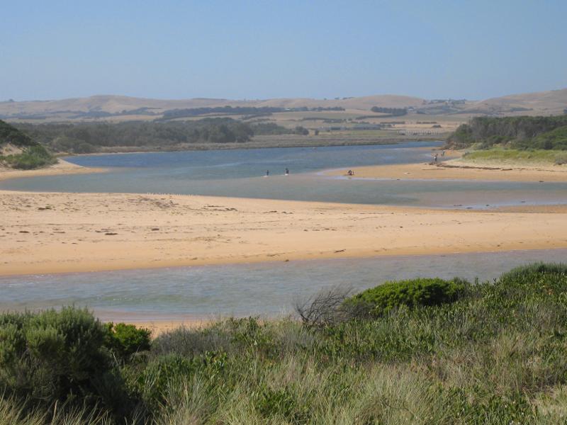 Kilcunda - Powlett River around river mouth and surrounding ocean beach: View north-west along river from sand dunes on east side of river mouth