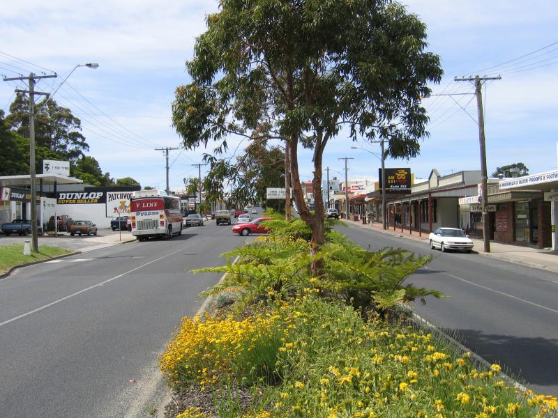 Korumburra - Commercial centre and shops, Commercial Road, Bridge Street and Mine Road: View south-east along Commercial St between Radovick St and King St