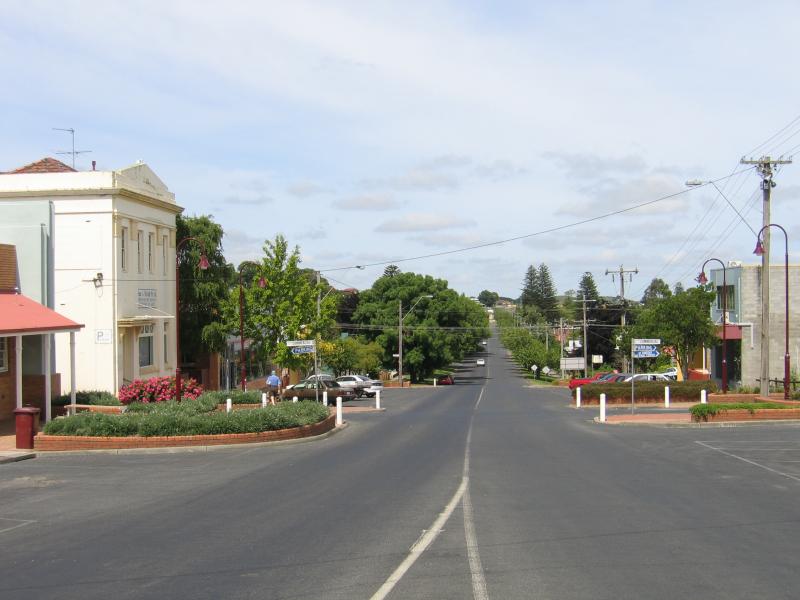 Korumburra - Commercial centre and shops, Commercial Road, Bridge Street and Mine Road - View south-west along Radovick St towards Little Commercial St
