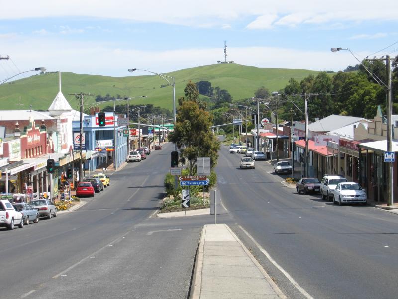 Korumburra - Commercial centre and shops, Commercial Road, Bridge Street and Mine Road: View north-west along Commercial St between Bridge St and Radovick St