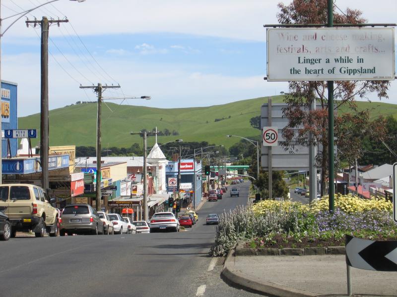 Korumburra - Commercial centre and shops, Commercial Road, Bridge Street and Mine Road: View north-west along Commercial St between Bridge St and Radovick St