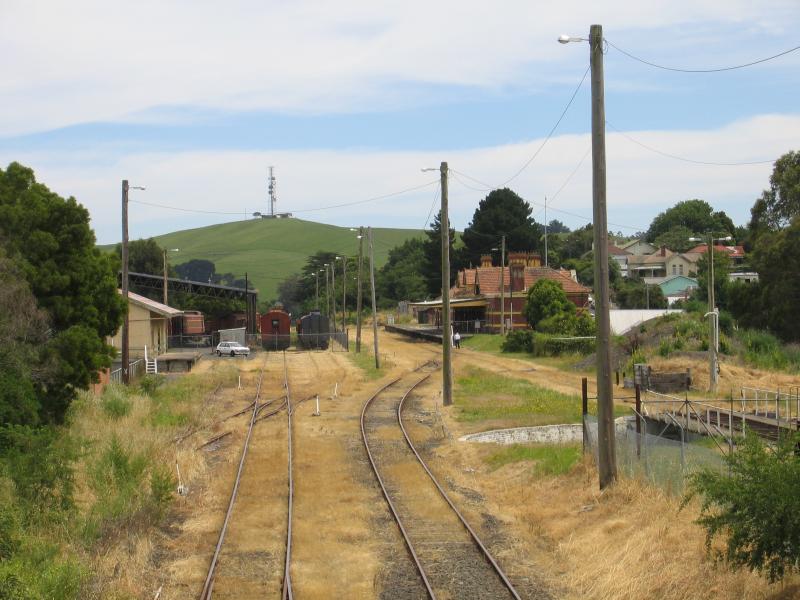 Korumburra - Korumburra railway station, Station Street: View north-west along railway line towards station from Bridge St overpass