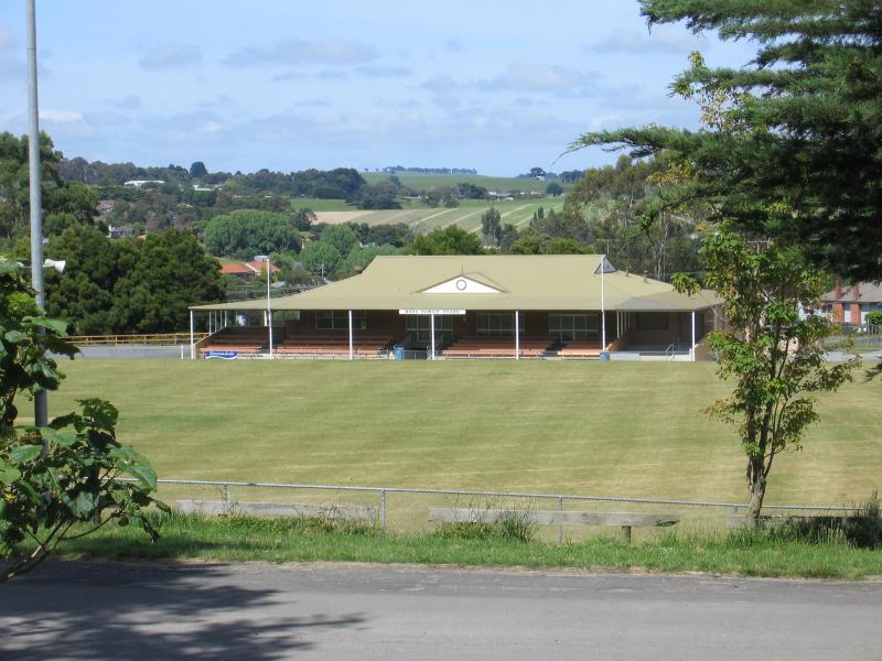 Korumburra - South Gippsland Highway through Korumburra: View to Ross Family Stand and oval, showgrounds, South Gippsland Highway