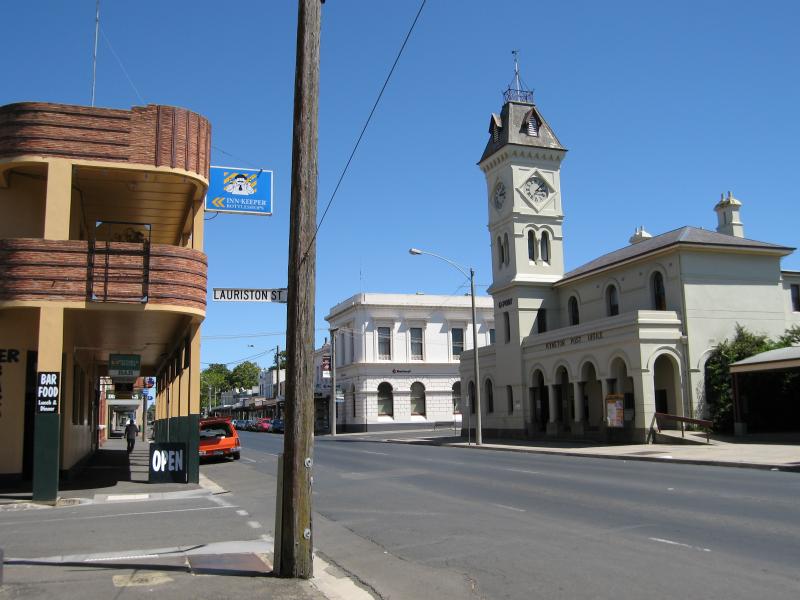 Kyneton - Shops along Mollison Street: View south along Mollison St at Lauriston St towards Shamrock Hotel and Kyneton Post Office