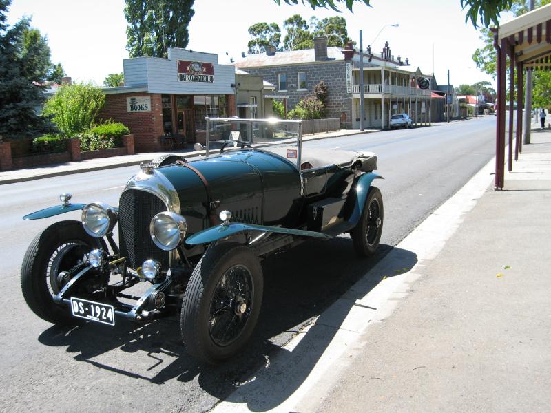 Kyneton - The historic Piper Street: Vintage car parked on Piper St, view east towards Ebden St