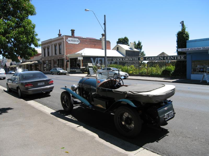 Kyneton - The historic Piper Street: Vintage car parked on Piper St, view west towards Powlett St