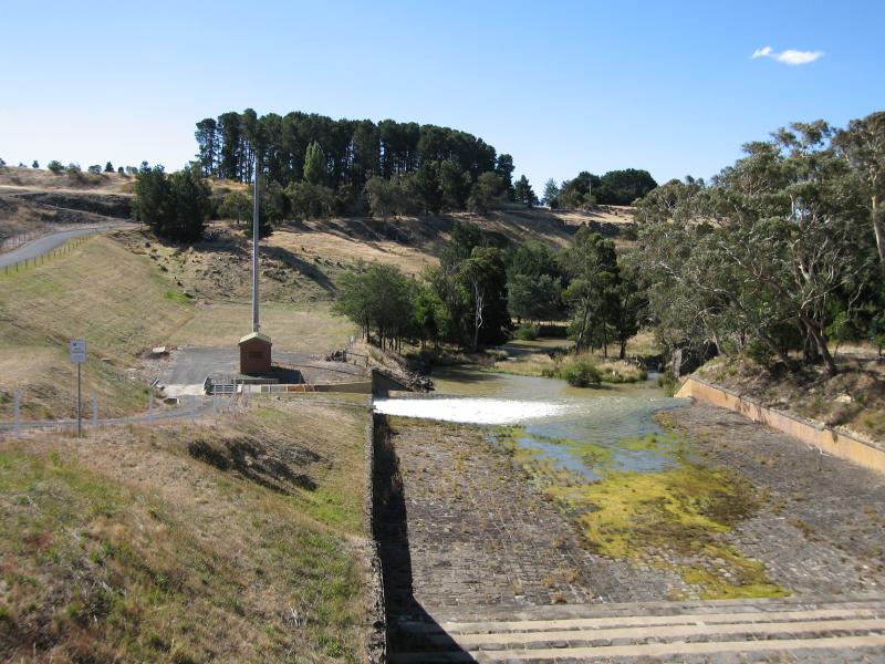 Kyneton - Upper Coliban Reservoir: View along spillway at dam wall from Springhill Rd