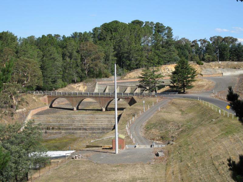 Kyneton - Upper Coliban Reservoir: View south towards Springhill Rd bridge over spillway at dam wall