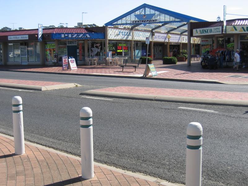 Lakes Entrance - Shops and accommodation along Esplanade: Centrepoint arcade, Esplanade at Barks Av