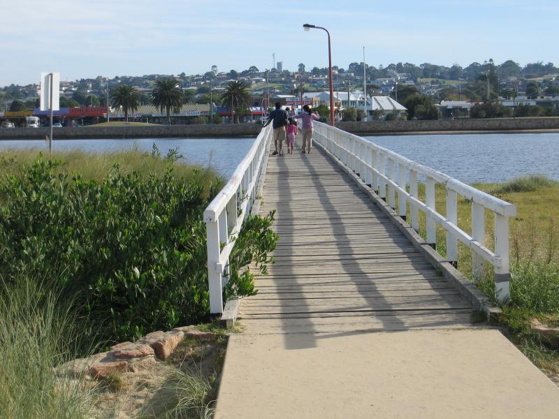 Lakes Entrance - Footbridge across Cunninghame Arm from Esplanade to Main Beach: View north along footbridge at Main Beach towards town centre