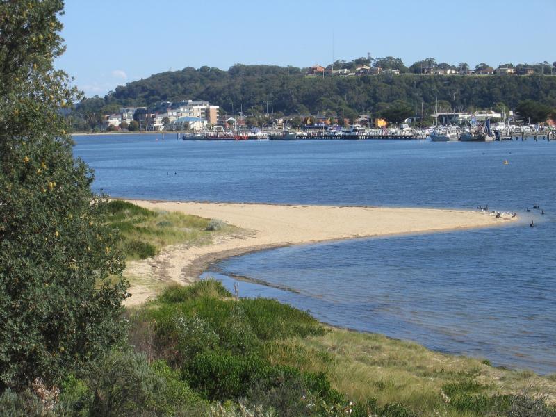Lakes Entrance - Main Beach along Cunninghame Arm: View west along coast from lookout west of footbridge