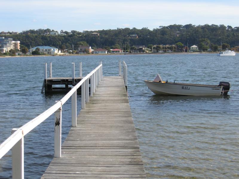 Lakes Entrance - Main Beach along Cunninghame Arm: View north along one of several jetties and across Cunninghame Arm