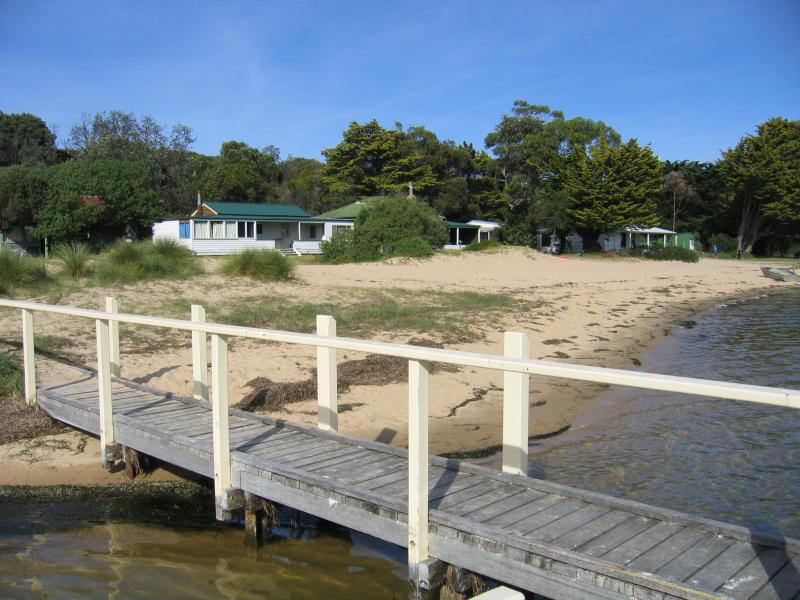 Lakes Entrance - Main Beach along Cunninghame Arm: Jetty and beachfront holiday houses
