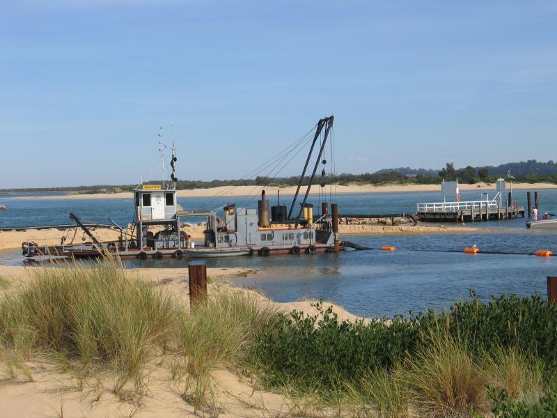 Lakes Entrance - Main Beach along Cunninghame Arm: The Sandpiper at work, Cunninghame Arm at The Narrows