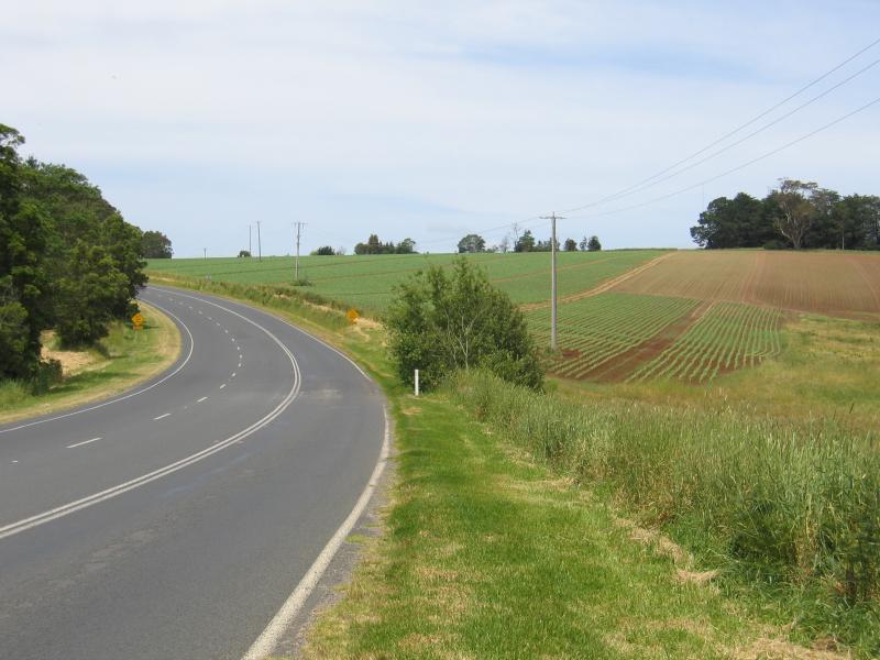 Leongatha - Around town: View south-east along South Gippsland Highway towards farming land, 3 km north of town