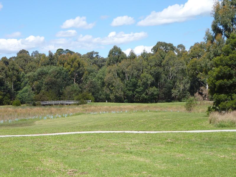 Lilydale - Hull Road Wetlands, Lakeview Drive: Easterly view across lawns and wetlands to footbridge
