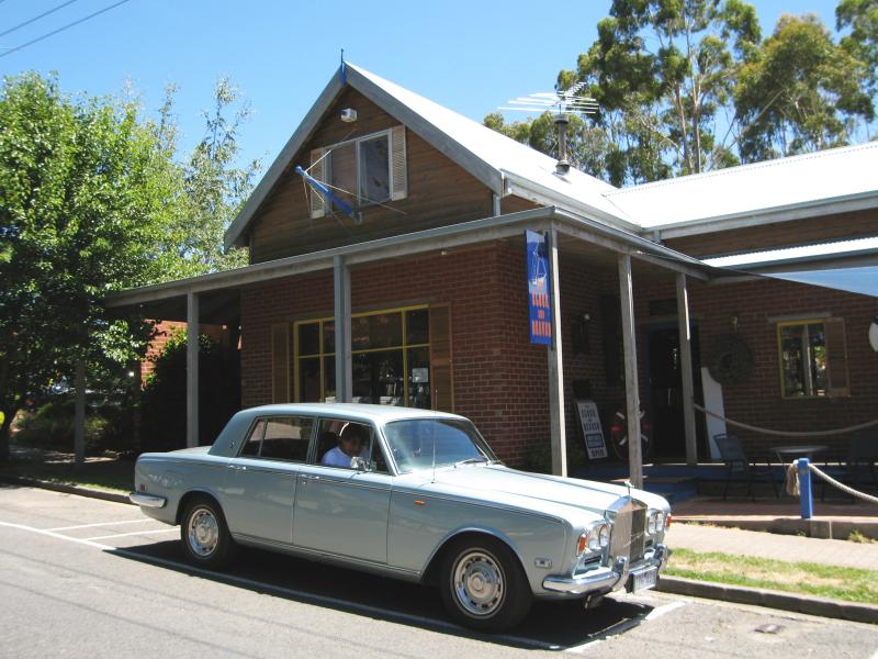 Macedon - Commercial centre and shops, Victoria Street: Rolls Royce parked in front of Clock and Beaver bar & cafe, corner Victoria St and Bruce St