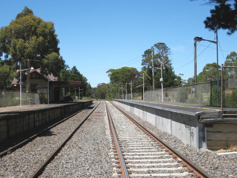 Macedon - Macedon railway station, off Victoria Street: View south along railway line at Victoria St