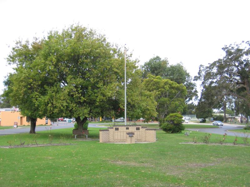 Mallacoota - Shops and commercial centre, Maurice Avenue: View east along gardens in Maurice Av median strip towards Betka Rd