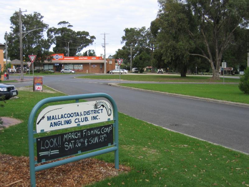 Mallacoota - Shops and commercial centre, Maurice Avenue: View east along Maurice Av towards roundabout at Betka Rd