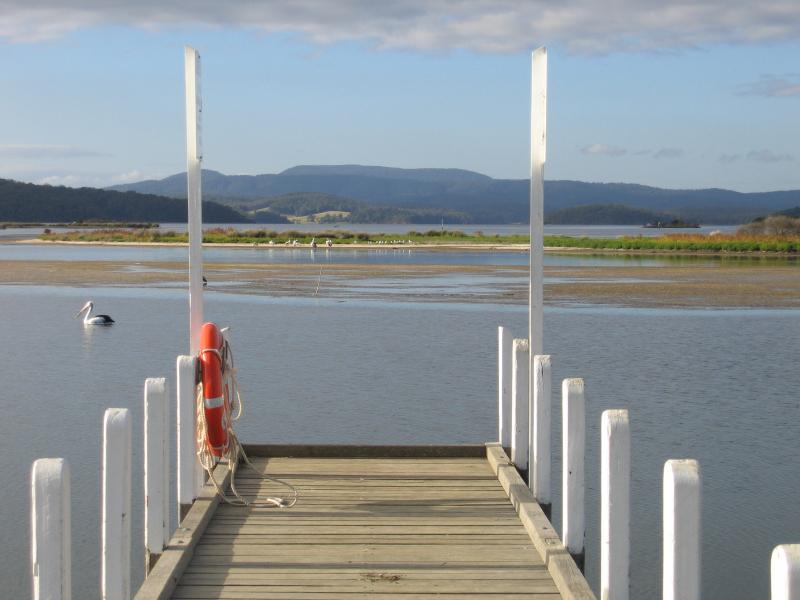 Mallacoota - Mallacoota Wharf, northern end of Buckland Drive: View north-east across Mallacoota Inlet from end of Slipway Jetty