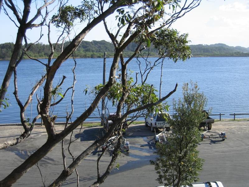 Marlo - Jetty, boat ramp and Foreshore Road: View south across car park at jetty towards Snowy River