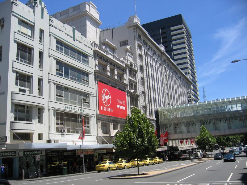 Melbourne CBD - Melbourne Central Shopping Centre and neighbouring department stores: View west along Lonsdale St at Swanston St towards Myer