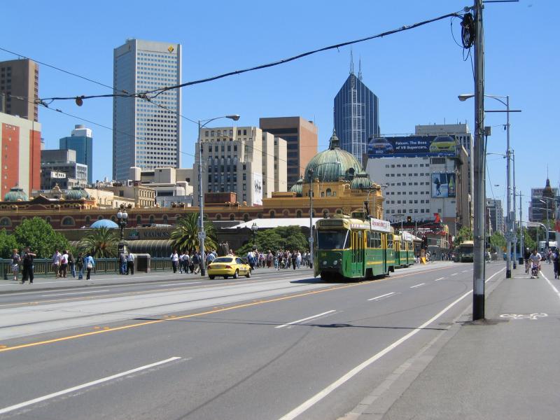 Melbourne CBD - Swanston Street: View north along Swanston St across Princes Bridge towards Flinders Street Station