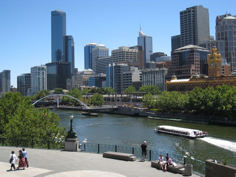 Melbourne CBD - Yarra River at Flinders Walk: View from across Yarra River towards Evan Walker Bridge and Rialto Towers