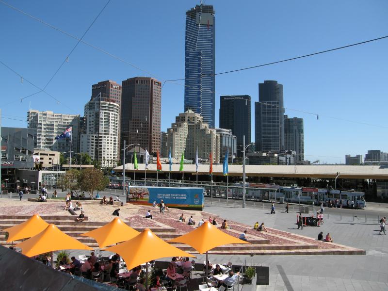 Melbourne CBD - Federation Square: View south-west across The Square towards Flinders Street Station and Eureka Tower