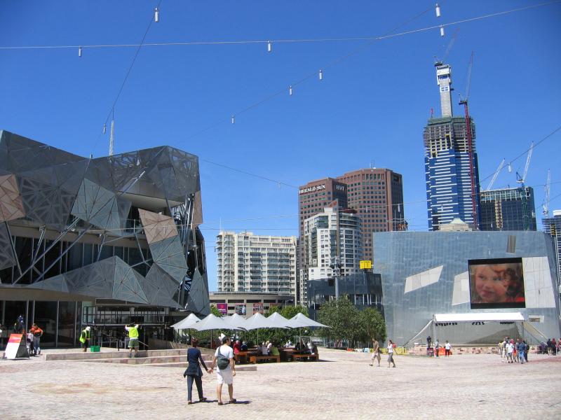 Melbourne CBD - Federation Square: View across The Square towards Yarra Building, video screen and Transport Hotel