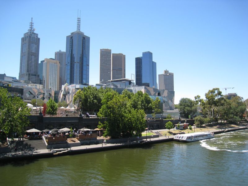 Melbourne CBD - Federation Square: Northerly view across Yarra River towards Federation Wharf and city skyline