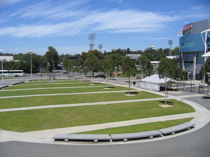 Melbourne CBD - Melbourne Park sporting venues, north side of Olympic Boulevard: View south along pedestrian plaza towards Olympic Bvd at Hisense Arena