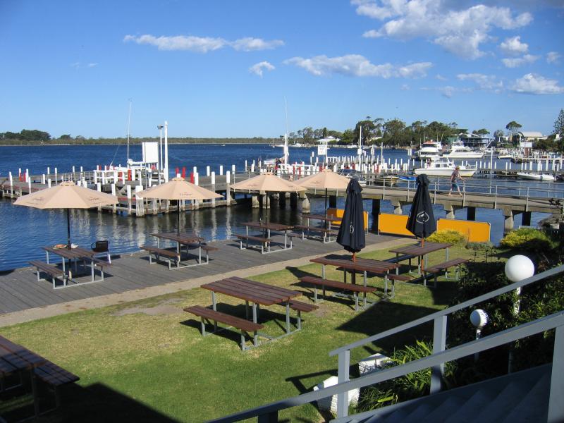 Metung - Metung Wharf and Metung Hotel, eastern end of Kurnai Avenue: View south along coast at front of Metung Hotel