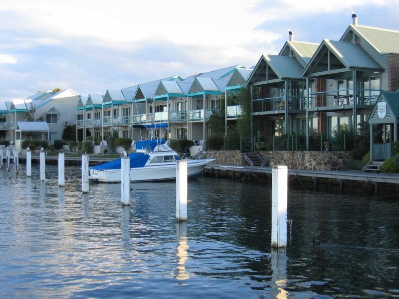 Metung - Metung Wharf and Metung Hotel, eastern end of Kurnai Avenue - Water front apartments, view south along coast