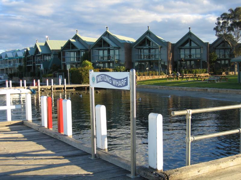 Metung - Metung Wharf and Metung Hotel, eastern end of Kurnai Avenue - View of water front apartments from wharf