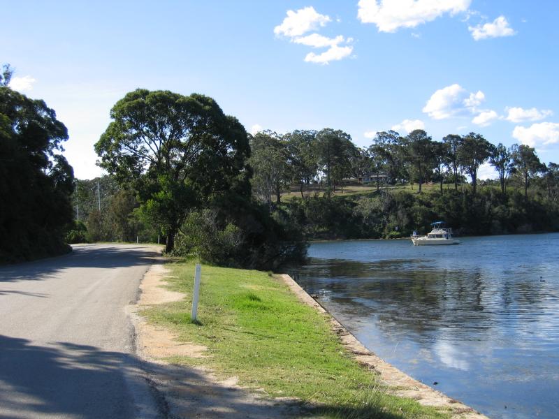 Metung - Metung Road, north of town centre: View north along Metung Rd and coast opposite McMillans Coastal Resort