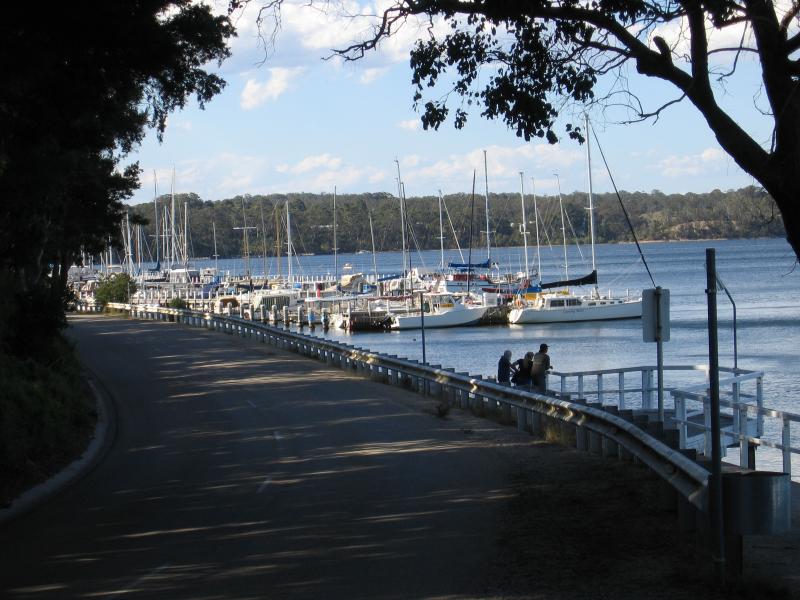Metung - Metung Road, north of town centre: View north along coast towards Yacht Club marina