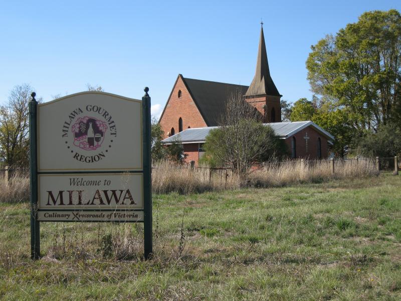 Milawa - Around Milawa: Milawa town sign, corner Snow Rd and Church La