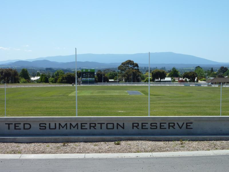 Moe - Ted Summerton Reserve: View north across oval near entrance at South St