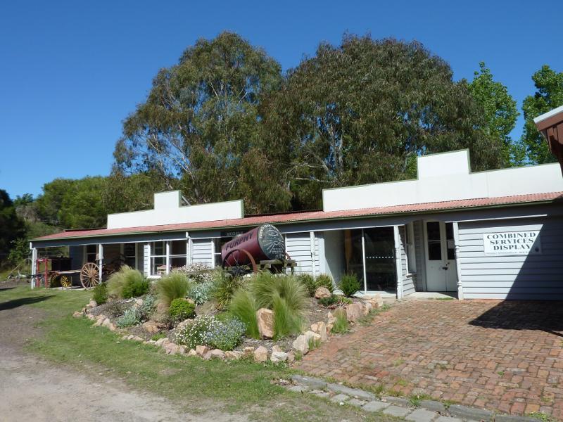 Moe - Gippsland Heritage Park, Lloyd Street: Printers building and military display